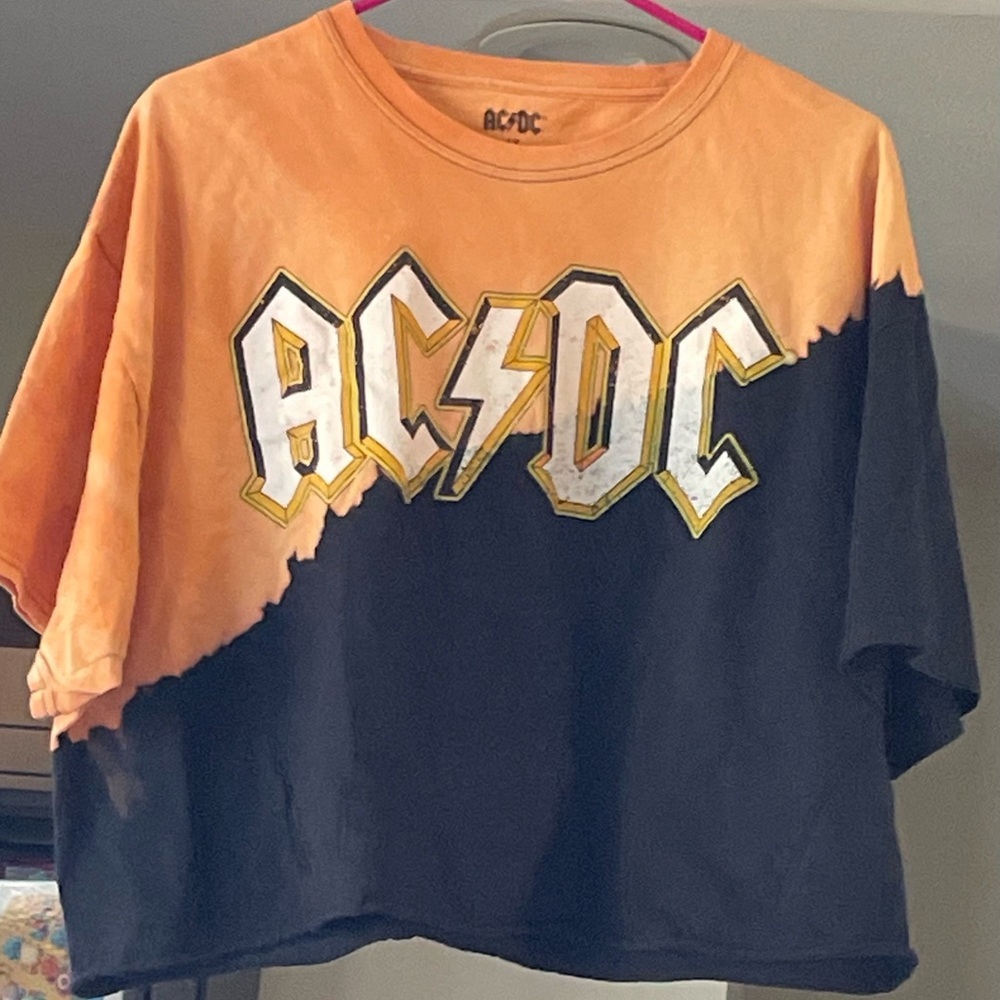 AC/DC Women’s Distressed Boxy Crew Neck Cropped Top with Gold Graphic Letters 1X
